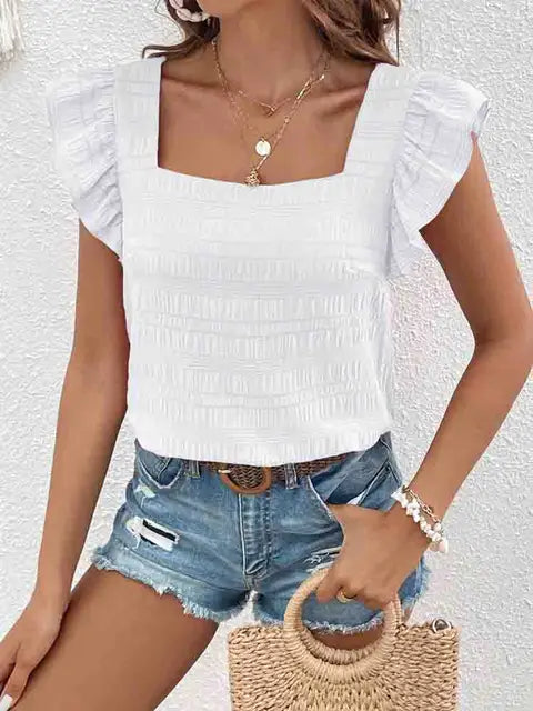 Schwarzes Oberteil mit Rüschen von Rosia