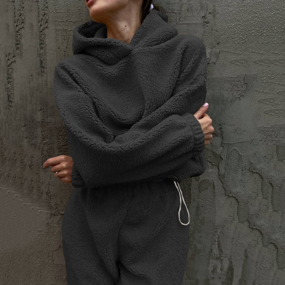 Damen gemütlicher Fleece-Jumpsuit mit elastischem Bund und Kapuze Stilzeits