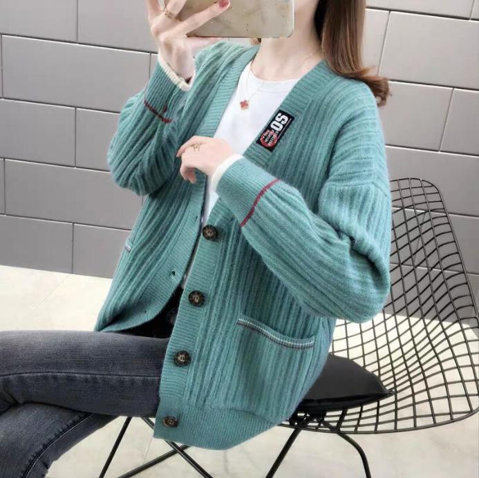 Damen Strickjacke mit strukturiertem Rippmuster und praktischen Taschen Stilzeits