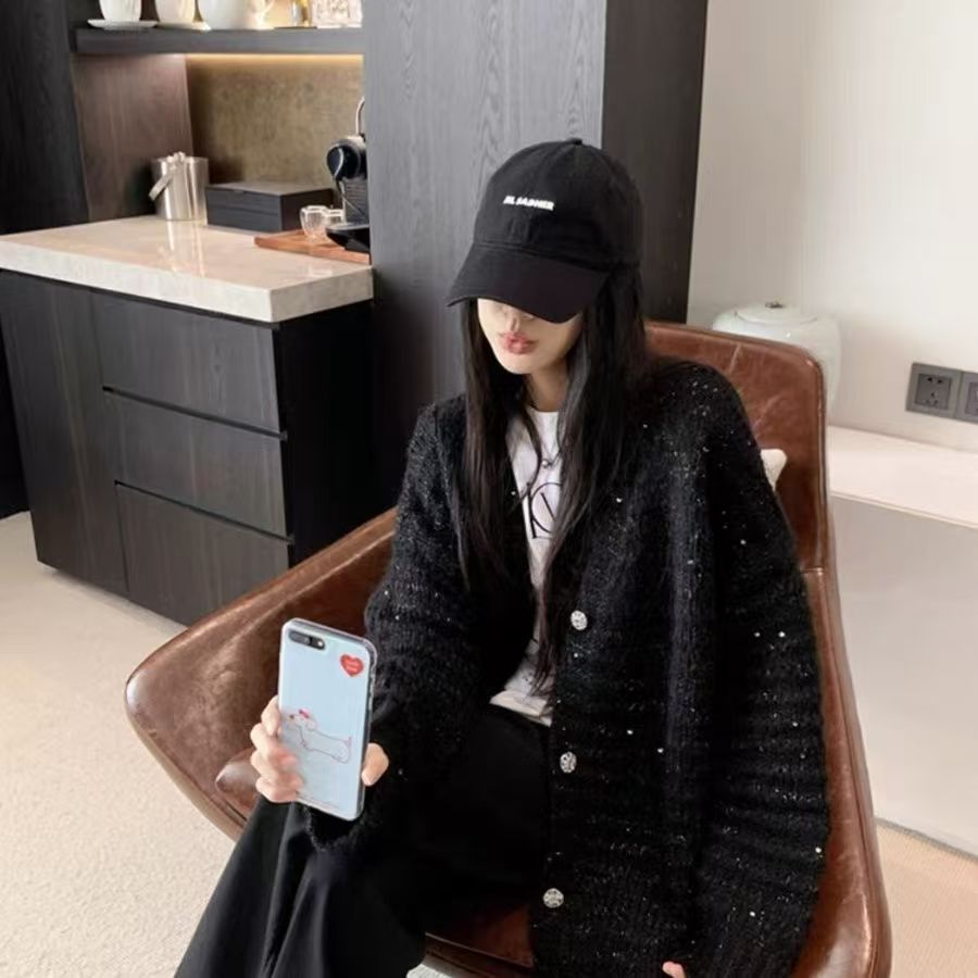 Damen Strickjacke mit voluminösen Ärmeln und einzigartiger Maschenstruktur Stilzeits