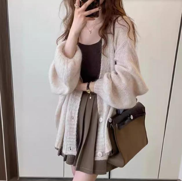 Damen Modische Strickjacke mit weiten Ärmeln und eleganten Details Stilzeits