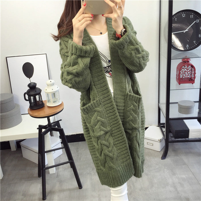 Damen Grobstrickjacke mit elegantem Zopfmuster und praktischen Taschen Stilzeits