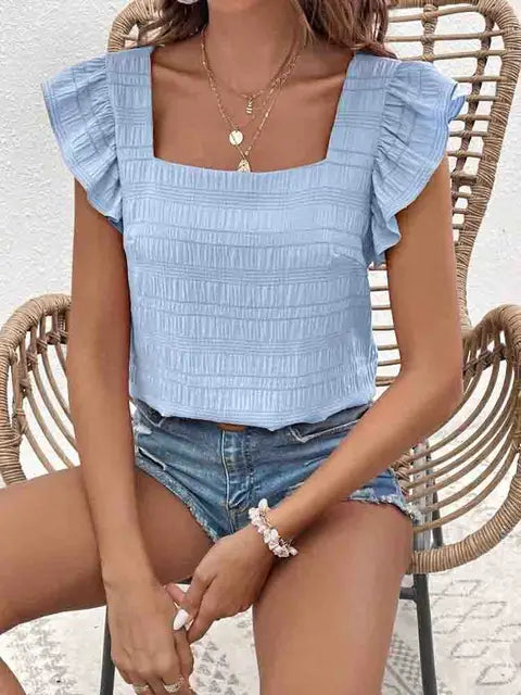 Schwarzes Oberteil mit Rüschen von Rosia