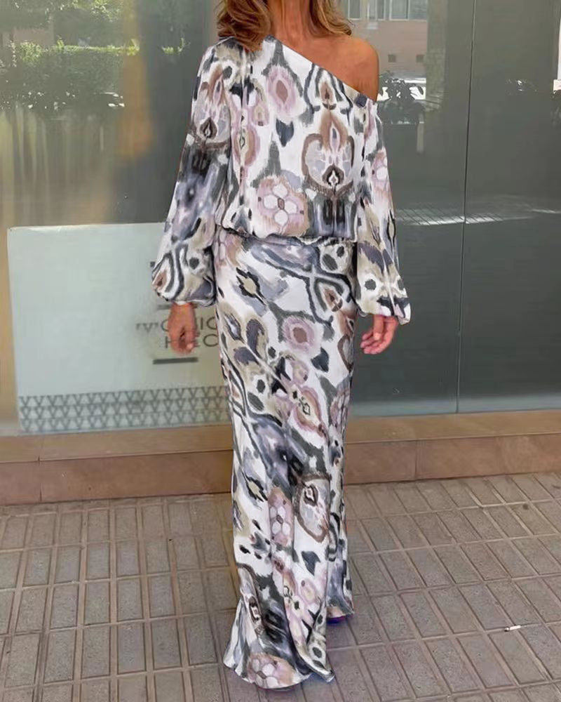 Damen Elegantes Maxikleid im grafischen Batikdesign mit Off-Shoulder-Ausschnitt und voluminösen Ärmeln Stilzeits
