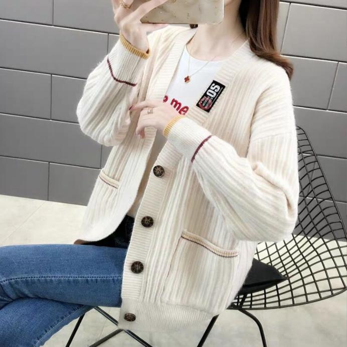 Damen Strickjacke mit strukturiertem Rippmuster und praktischen Taschen Stilzeits