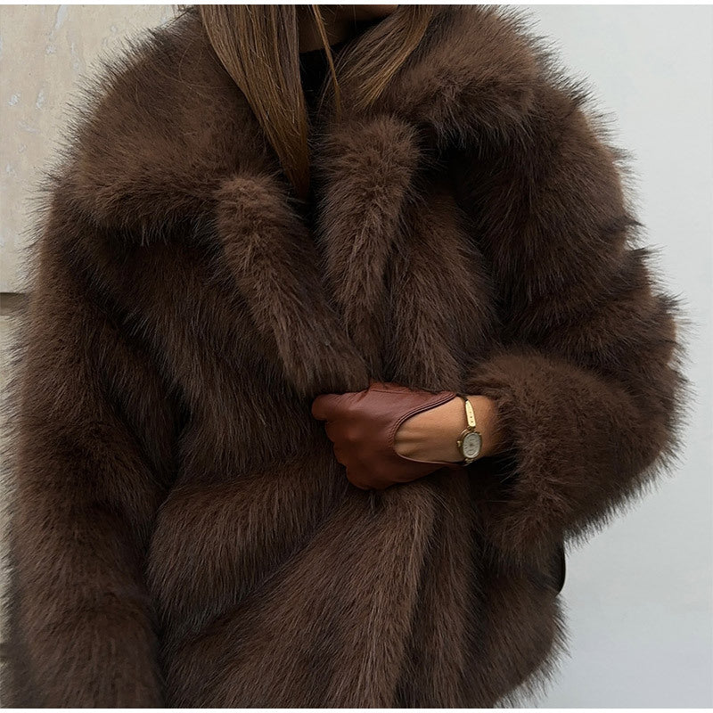 Damen Kunstfelljacke mit voluminösem Schnitt und elegantem Design Stilzeits