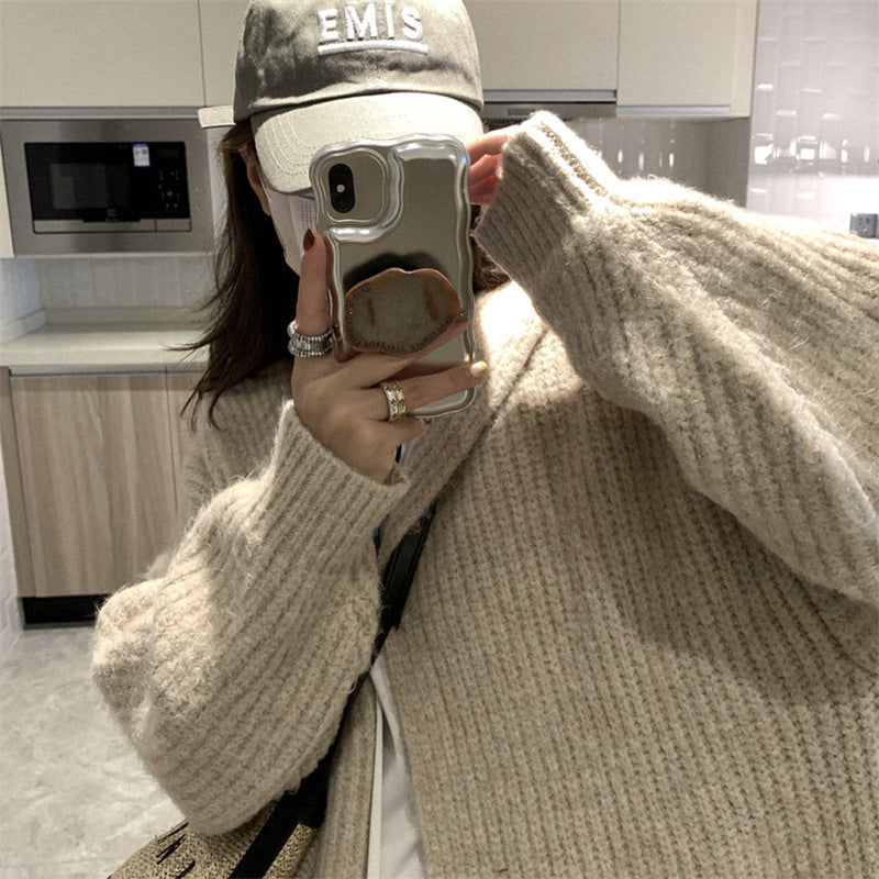 Damen Langstrickjacke mit eleganter Rippstruktur und praktischen Taschen Stilzeits