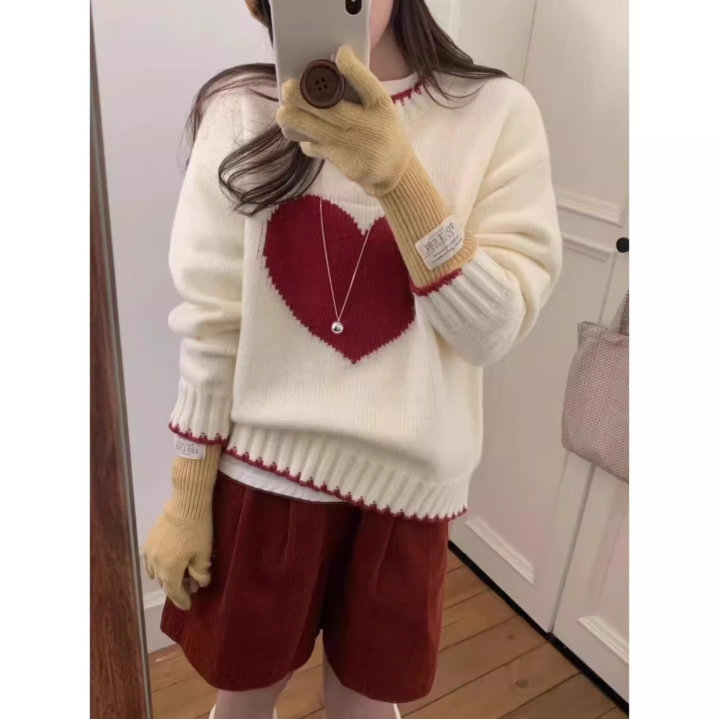 Damen angesagter Pullover mit Herzmotiv und lässigem Schnitt Stilzeits