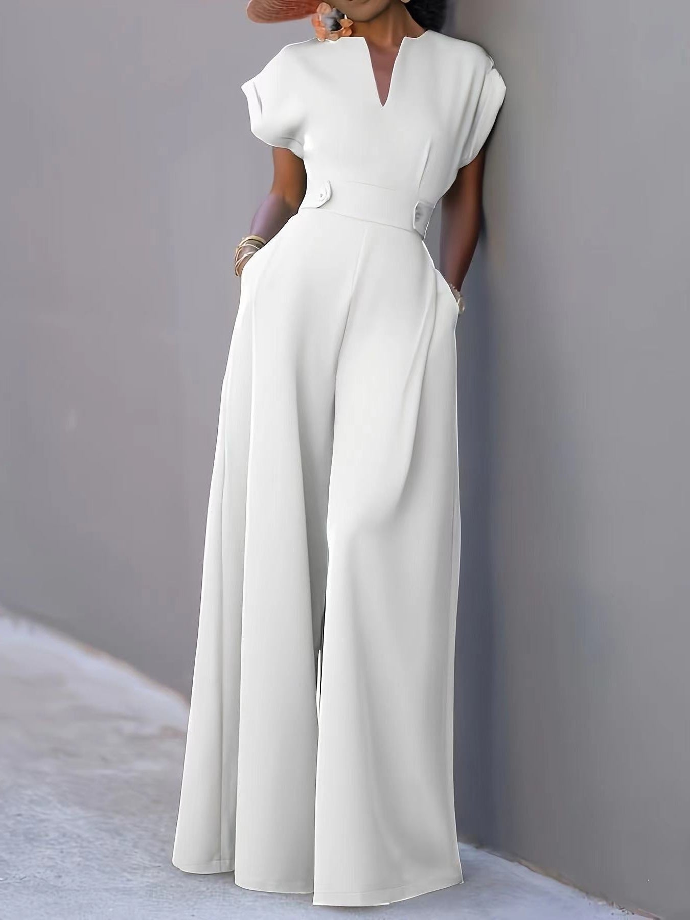Damen eleganter Jumpsuit mit weitem Bein und praktischen Taschen Stilzeits