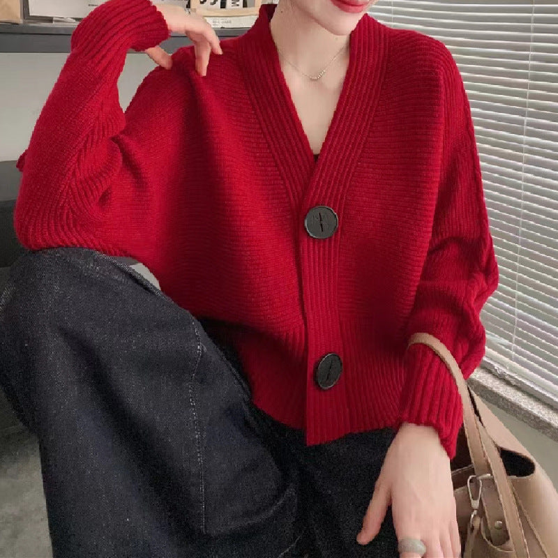 Damen modische Strickjacke mit großen Knöpfen und seitlich offenen Ärmeln Stilzeits