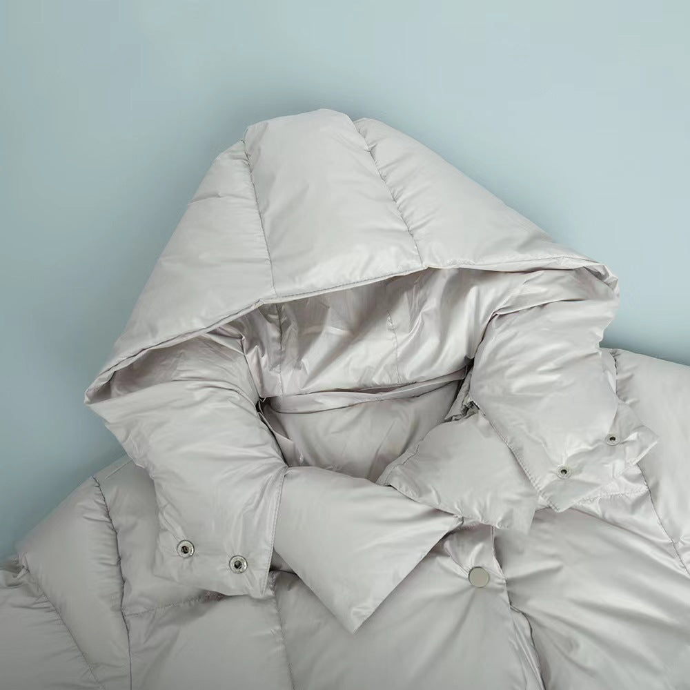 Damen oversized Daunenjacke mit hohem Kragen und voluminösen Ärmeln Stilzeits