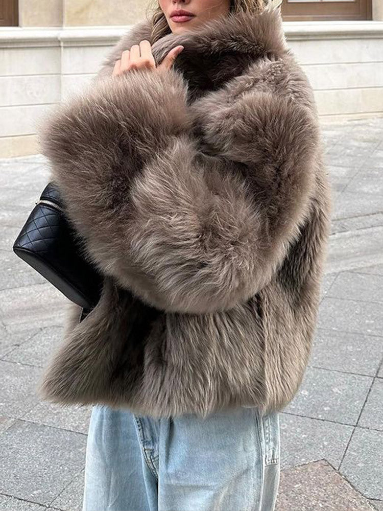 Damen Kunstfelljacke mit hochschließendem Kragen und luxuriösem Design Stilzeits