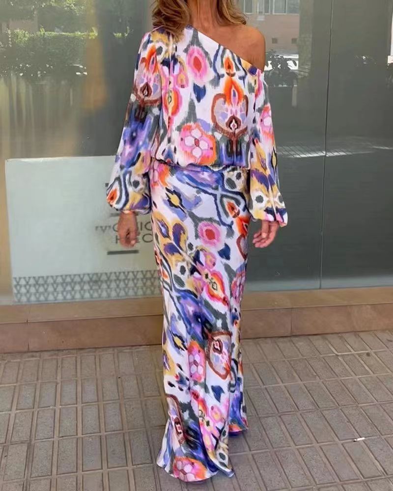 Damen Elegantes Maxikleid im grafischen Batikdesign mit Off-Shoulder-Ausschnitt und voluminösen Ärmeln Stilzeits