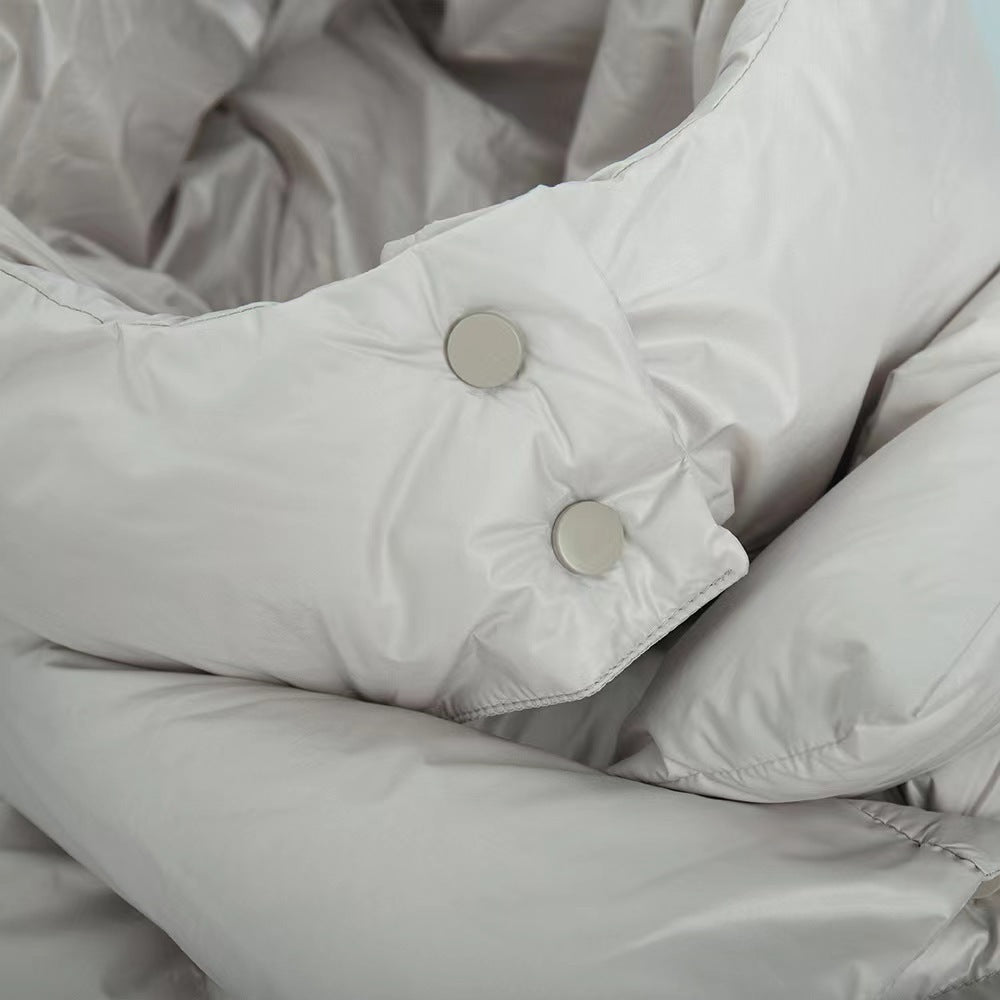 Damen oversized Daunenjacke mit hohem Kragen und voluminösen Ärmeln Stilzeits