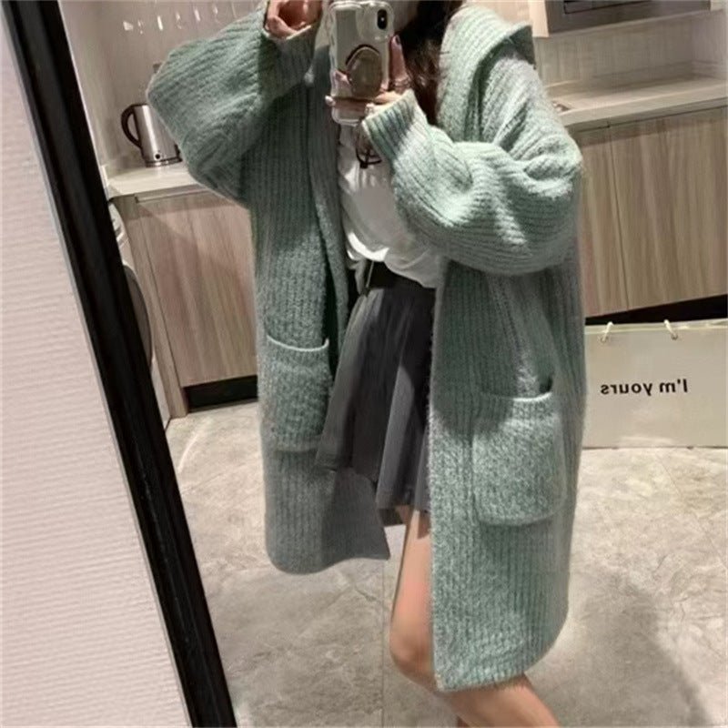 Damen Langstrickjacke mit eleganter Rippstruktur und praktischen Taschen Stilzeits