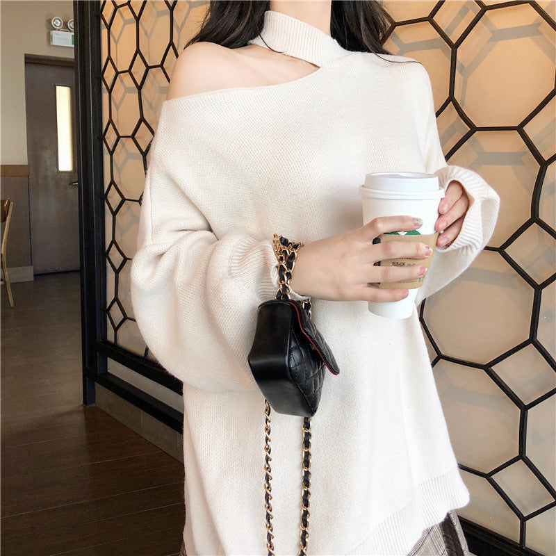 Damen modischer Oversized-Pullover mit schulterfreier Schnittführung und Rollkragen Stilzeits